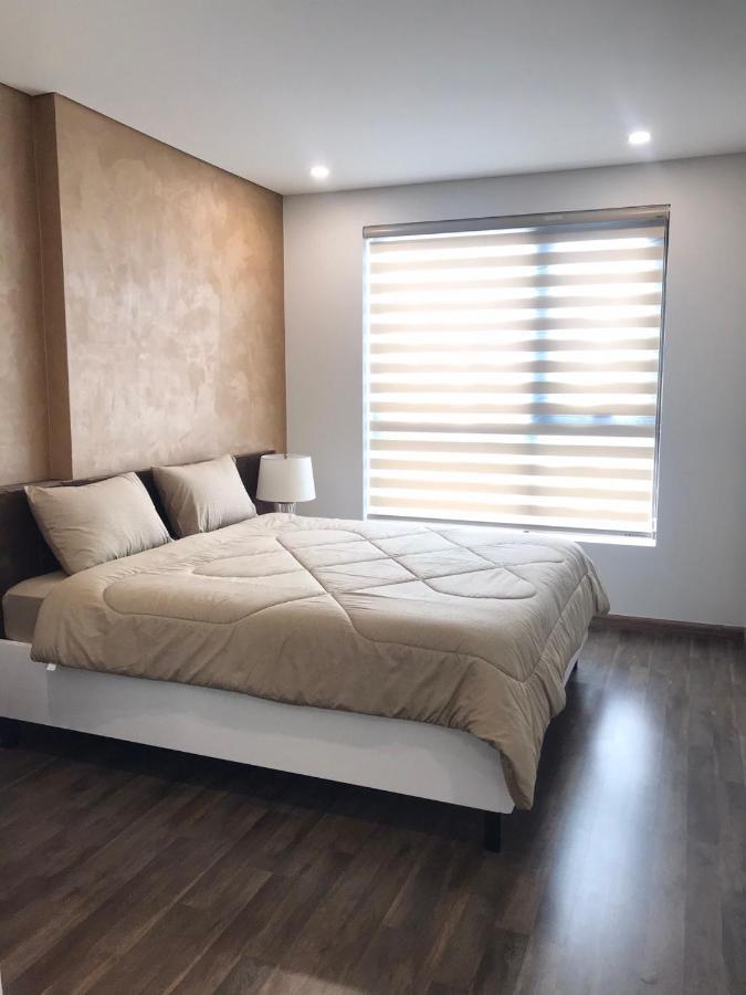 Qhome Dlux 2Pn Ho Chi Minh City Bagian luar foto